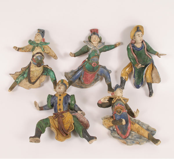 Appraisal: Painted and glazed earthenware mudmen roof tiles ornamentation five figures