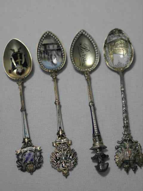 Appraisal: Lot of four assorted enameled silver spoons Includes one representing