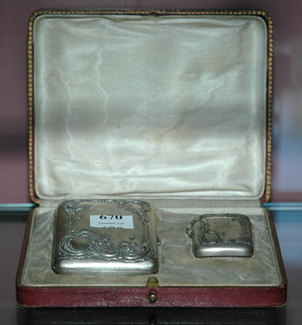 Appraisal: A MATCHING SILVER CARD CASE AND VESTA Including presentation case