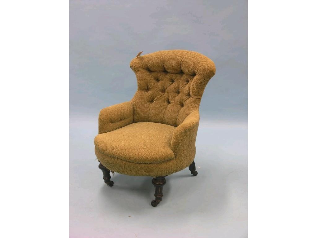 Appraisal: A Victorian upholstered nursing chair on front turned and ebonised