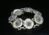 Appraisal: Georg Jensen Sterling Lapis Bracelet Seven linked flowers with cabochon