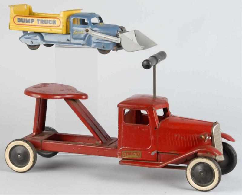 Appraisal: Lot of Pressed Steel Truck Toys Description Includes one ride-on