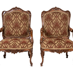 Appraisal: A Pair of Rococo Style Carved Walnut Armchairs th Century