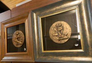 Appraisal: Pair of plaster medallions Pair of plaster medaliions artist signed