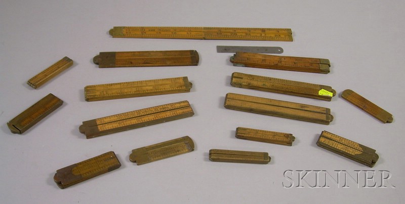 Appraisal: Fifteen Brass-mounted Folding Wooden Rulers