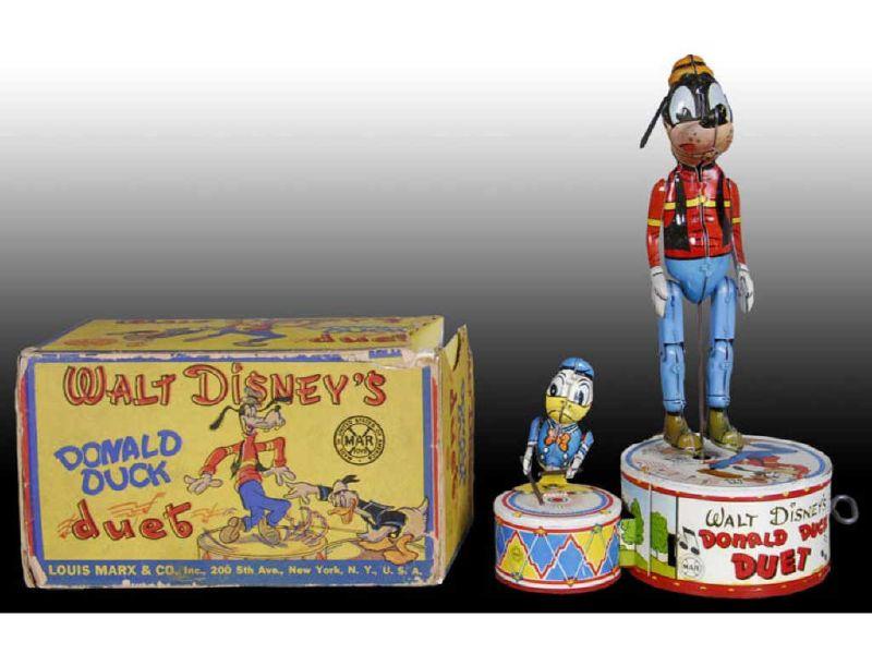 Appraisal: Marx Tin Wind-Up Walt Disney Donald Duck Duet Toy Description