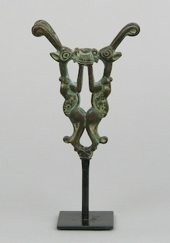 Appraisal: A Luristan Bronze Standard Finial A bronze standard finial with