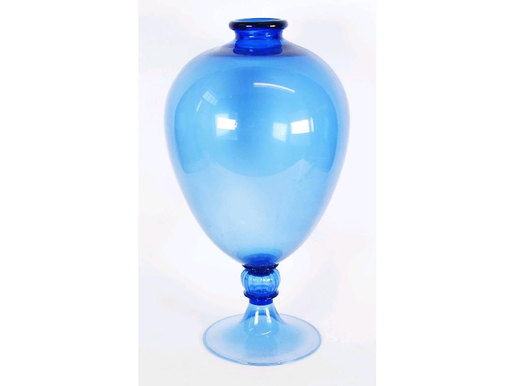 Appraisal: LARGE BLUE GLASS PEDESTAL VASE ovoid with narrow lipped rim