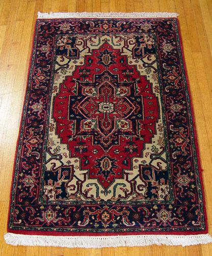 Appraisal: HAND TIED INDO HERIZ RUG Approx ' '' x '