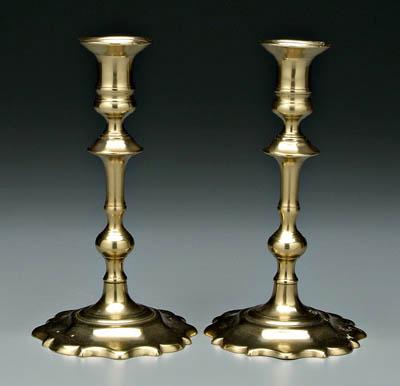 Appraisal: Pair English brass candlesticks baluster posts above scalloped and ruffled