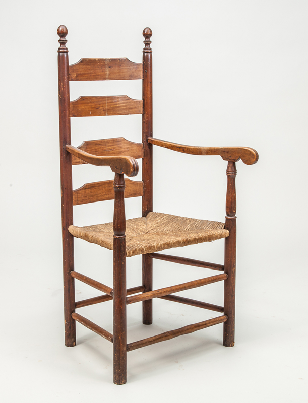 Appraisal: WILLIAM AND MARY MAPLE AND PINE LADDER-BACK ARMCHAIR With rush