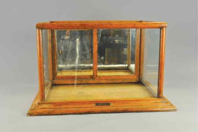 Appraisal: WOODEN COUNTERTOP DISPLAY CASE Glass view with wood frame doors