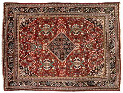 Appraisal: Baktiari carpet diamond central medallion on red ground with repeating