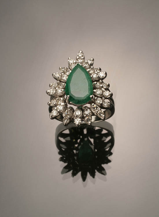 Appraisal: -Karat White-Gold Emerald and Diamond Dinner Ring Set with one