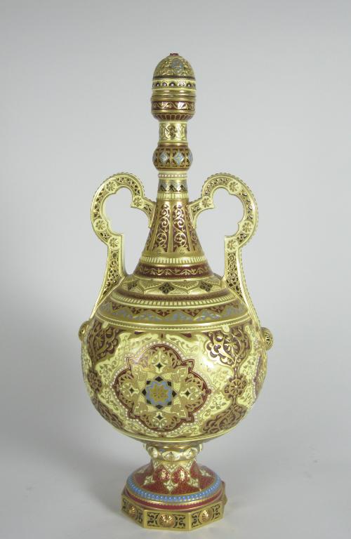 Appraisal: A Derby Vase and Cover Persian style the two handles