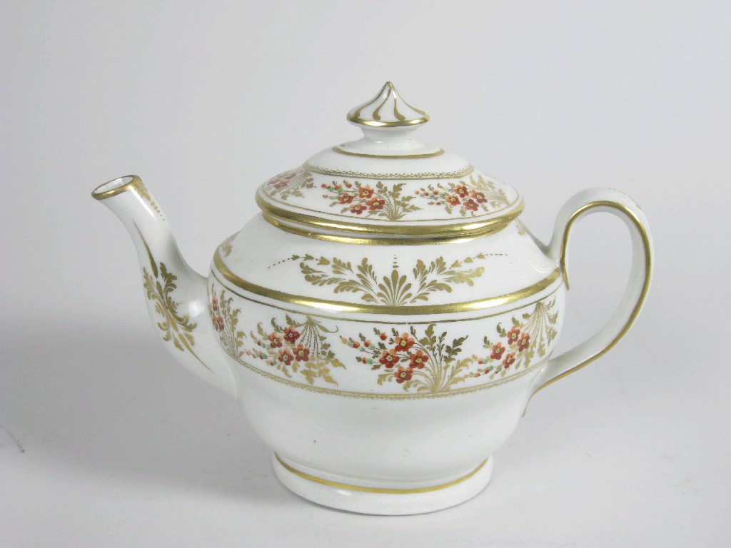 Appraisal: A New Hall oval Teapot with lid decorated gold leaved