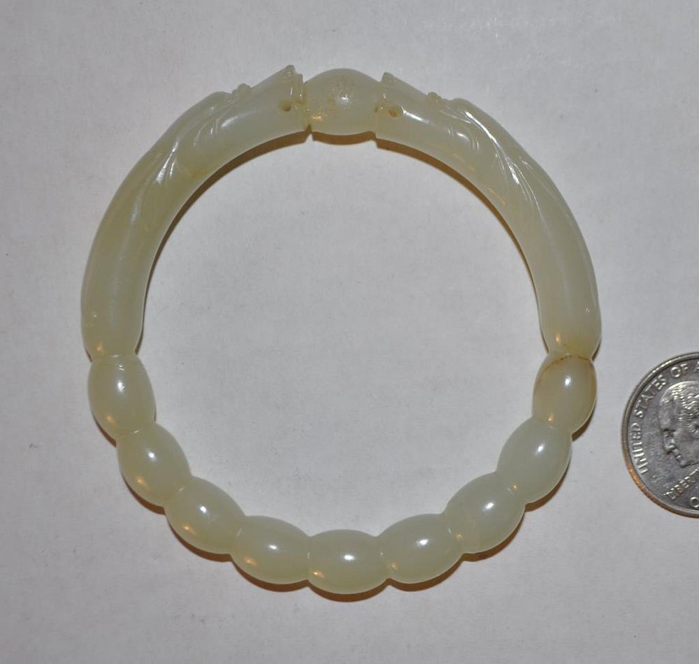 Appraisal: White Jade Dragon Pearl Carved Bangle Bracelet diameter Repair to