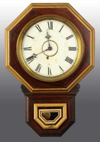 Appraisal: Octagonal Wall Clock Description Time only clock with pendulum Condition