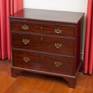 Appraisal: George III mahogany bachelor's chest George III mahogany bachelor's chest