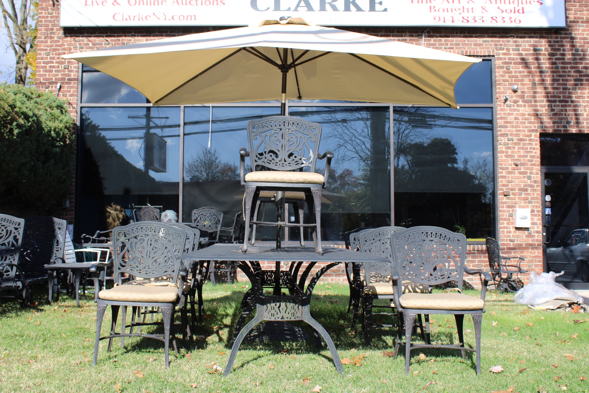 Appraisal: Vintage Patinated Iron Table Chairs Umbrella A great size table