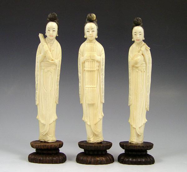 Appraisal: CHINESE CARVED IVORY FEMALE MUSICIAN FIGURES Set of each holding