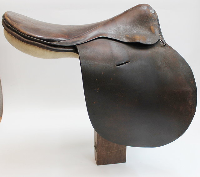 Appraisal: AN EARLY TH CENTURY SMALL SIZE LEATHER SADDLE complete with