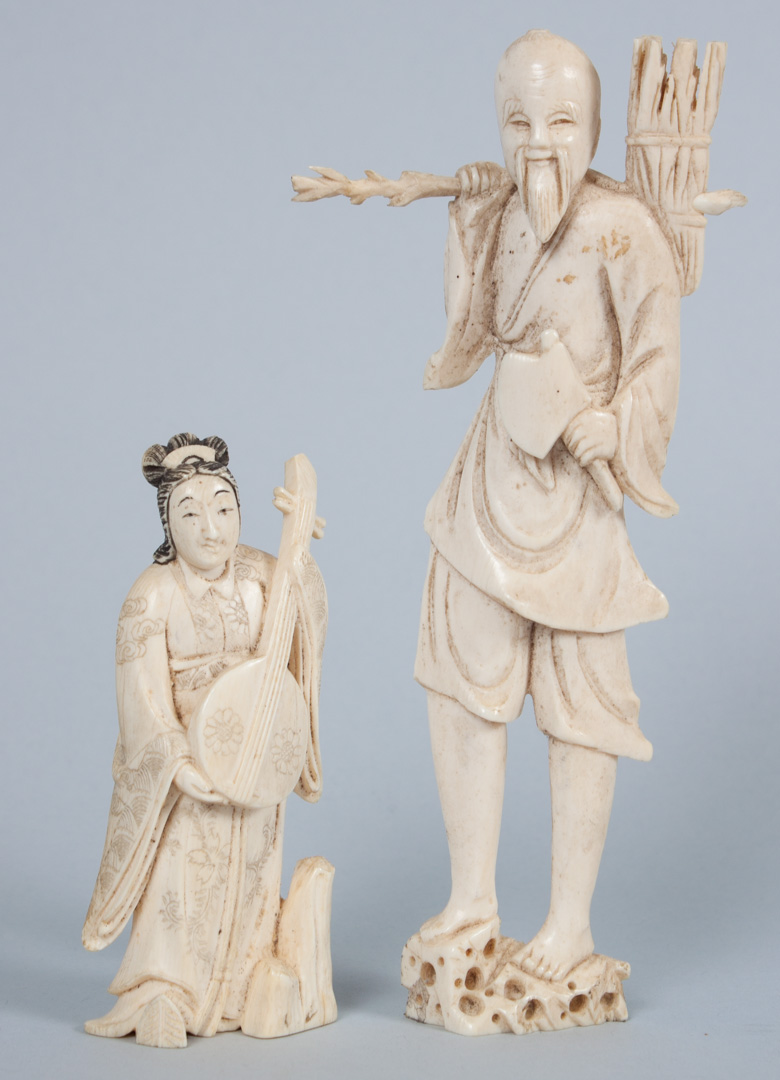 Appraisal: Two Japanese carved ivory figures figure of wood chopper in