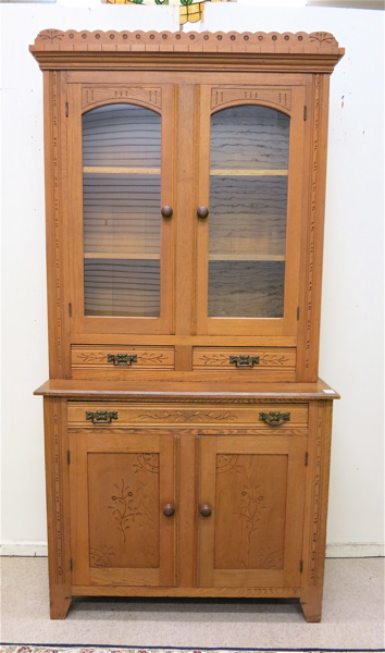 Appraisal: COUNTRY VICTORIAN ASH CABINET ON CABINET Eastlake design American th