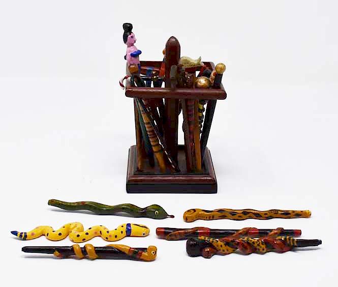 Appraisal: miniature carved decorated canes by Tom King miniature carved decorated