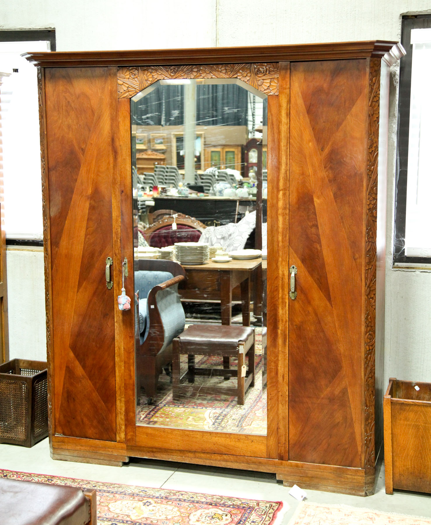 Appraisal: ARMOIRE American mid th century walnut Stepped cornice and a