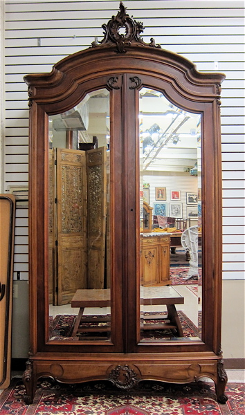 Appraisal: LOUIS XV STYLE DOUBLE-DOOR WALNUT ARMOIRE French c having a