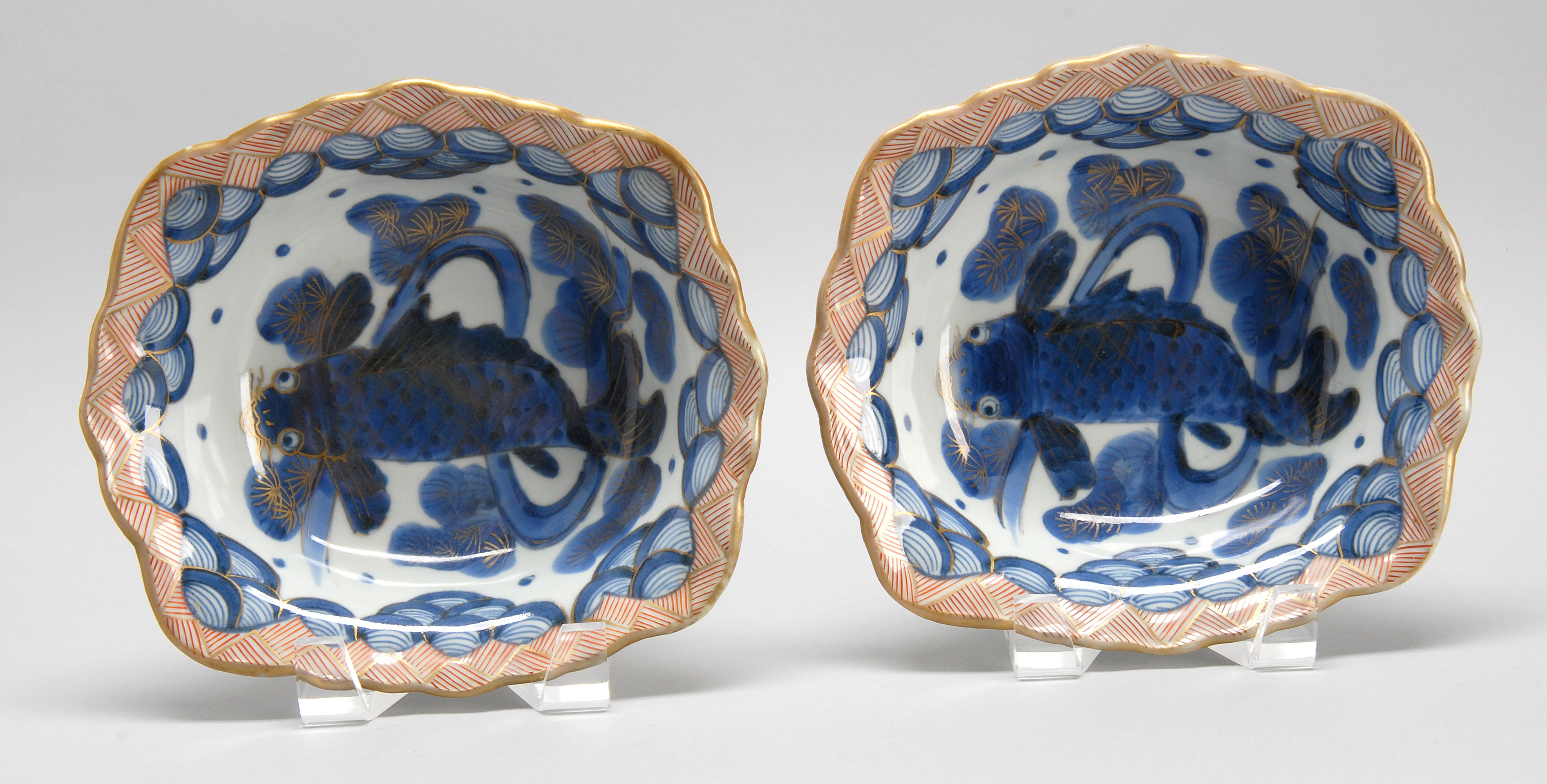 Appraisal: PAIR OF IMARI PORCELAIN BOWLS Meiji Period In modified rectangular