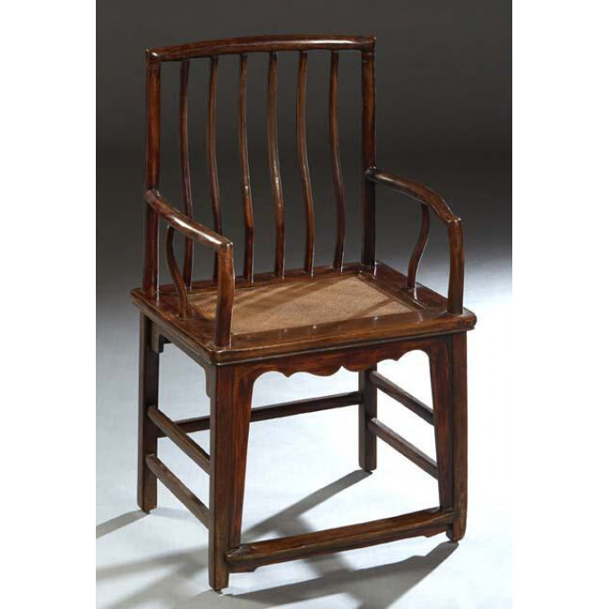 Appraisal: Ming-Style Carved Elm Armchair th c the curved spindled back