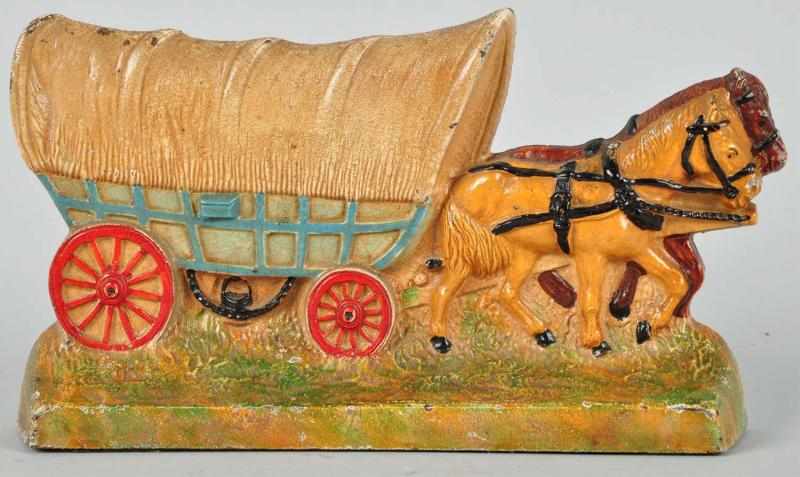 Appraisal: Cast Iron Conestoga Horse-Drawn Wagon Doorstop Description Hubley Condition Near