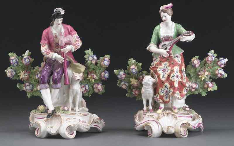 Appraisal: Chelsea Bow porcelain figuresmodeled as a lady playing a mandolin