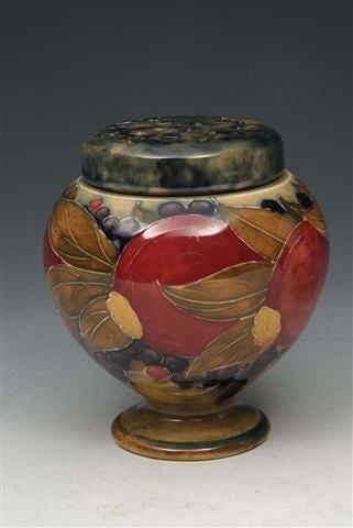 Appraisal: A MOORCROFT 'POMEGRANATE' PATTERN POT POURRI VASE and cover the