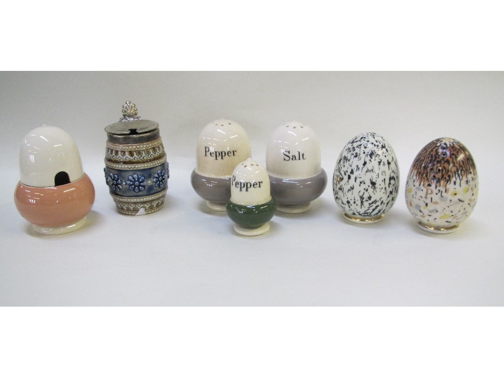 Appraisal: Five Macintyre Co pepper pots a mustard and a Doulton