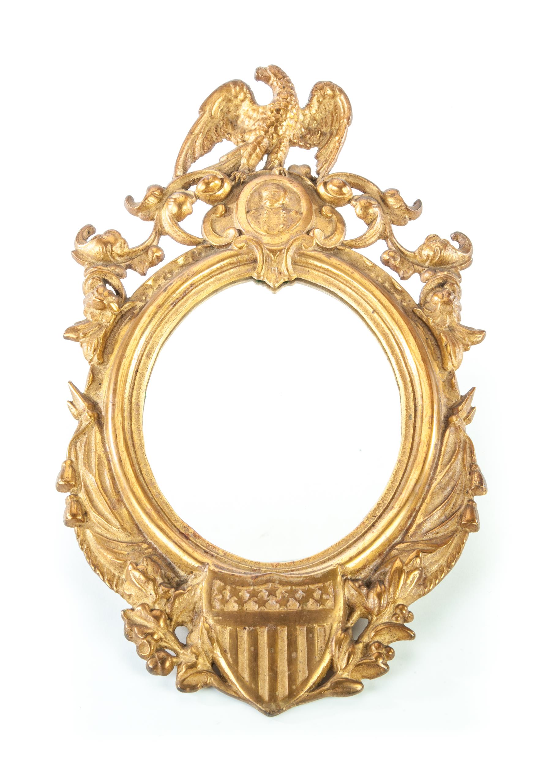 Appraisal: AMERICAN CAST IRON MIRROR Second half - th century Eagle