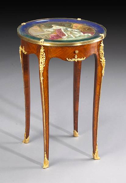 Appraisal: A Louis XV style gilt bronze and porcelain mounted rosewood