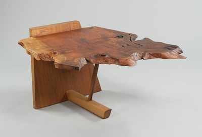 Appraisal: A Walnut Kevin Table by George Nakashima A free-edge slab