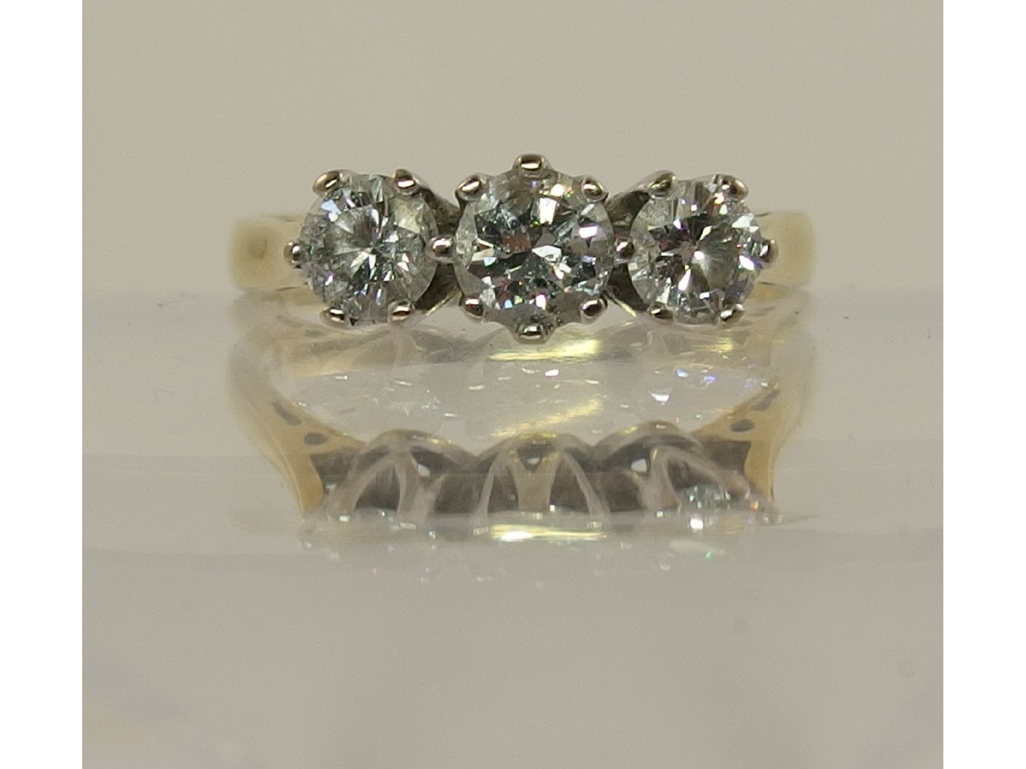 Appraisal: An ct gold three stone diamond ring of approx cts