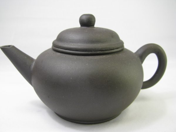 Appraisal: Miniature Chinese black salt glazed teapot Character mark on base