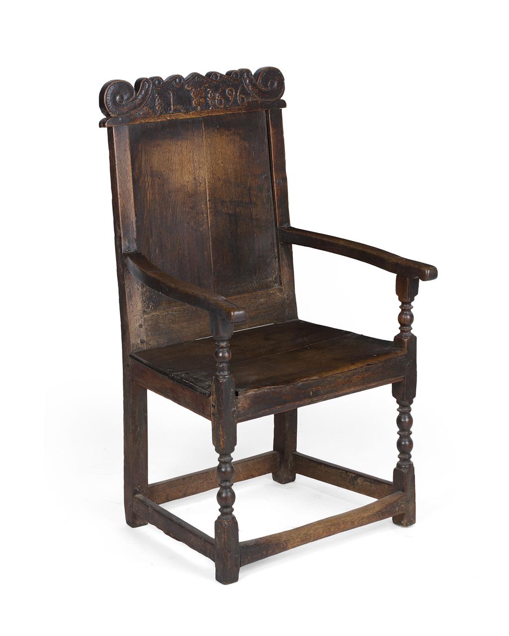 Appraisal: SCOTTISH OAK ARMCHAIR TH CENTURY the scroll carved crest rail