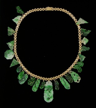 Appraisal: k Gold Chain with Carved Jade Ornaments A thick k