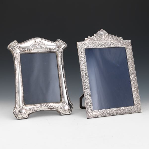 Appraisal: TWO STERLING SILVER PICTURE FRAMES Sterling silver picture frame with