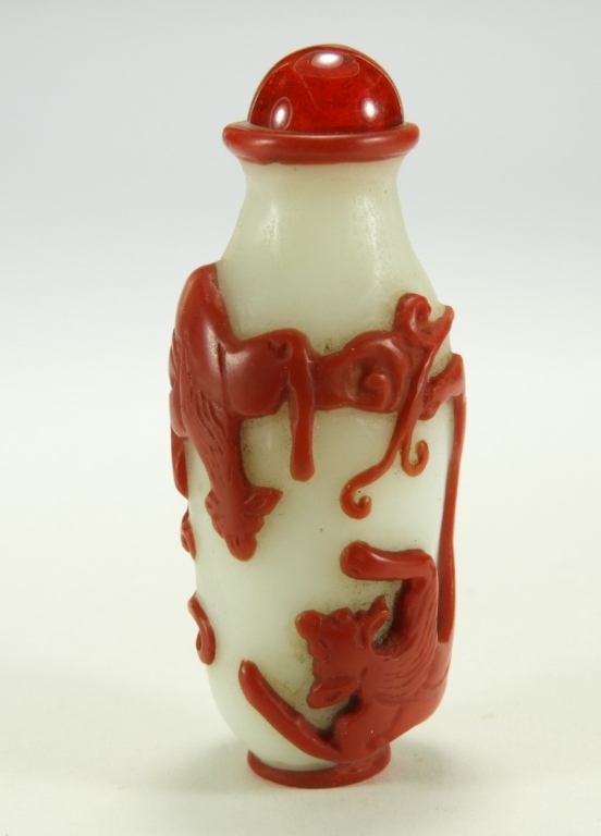 Appraisal: CHINESE RED BAT OVERLAY PEKING GLASS SNUFF BOTTLE China st