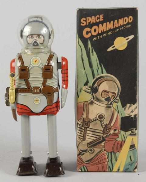 Appraisal: Tin Litho Space Commando Astronaut Wind-Up Toy Description Japanese Working