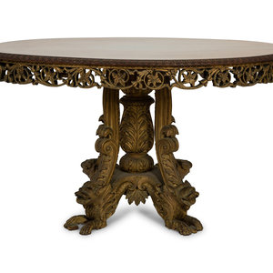 Appraisal: An Anglo-Indian Carved and Parcel Gilt Tilt-Top Table with Lion