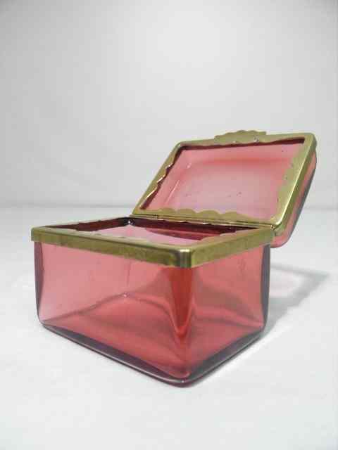 Appraisal: Late th century cranberry glass casket Gilt bronze mounts Unmarked