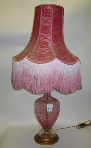 Appraisal: A PINK SWIRL GLASS TABLE LAMP having a handmade fringed